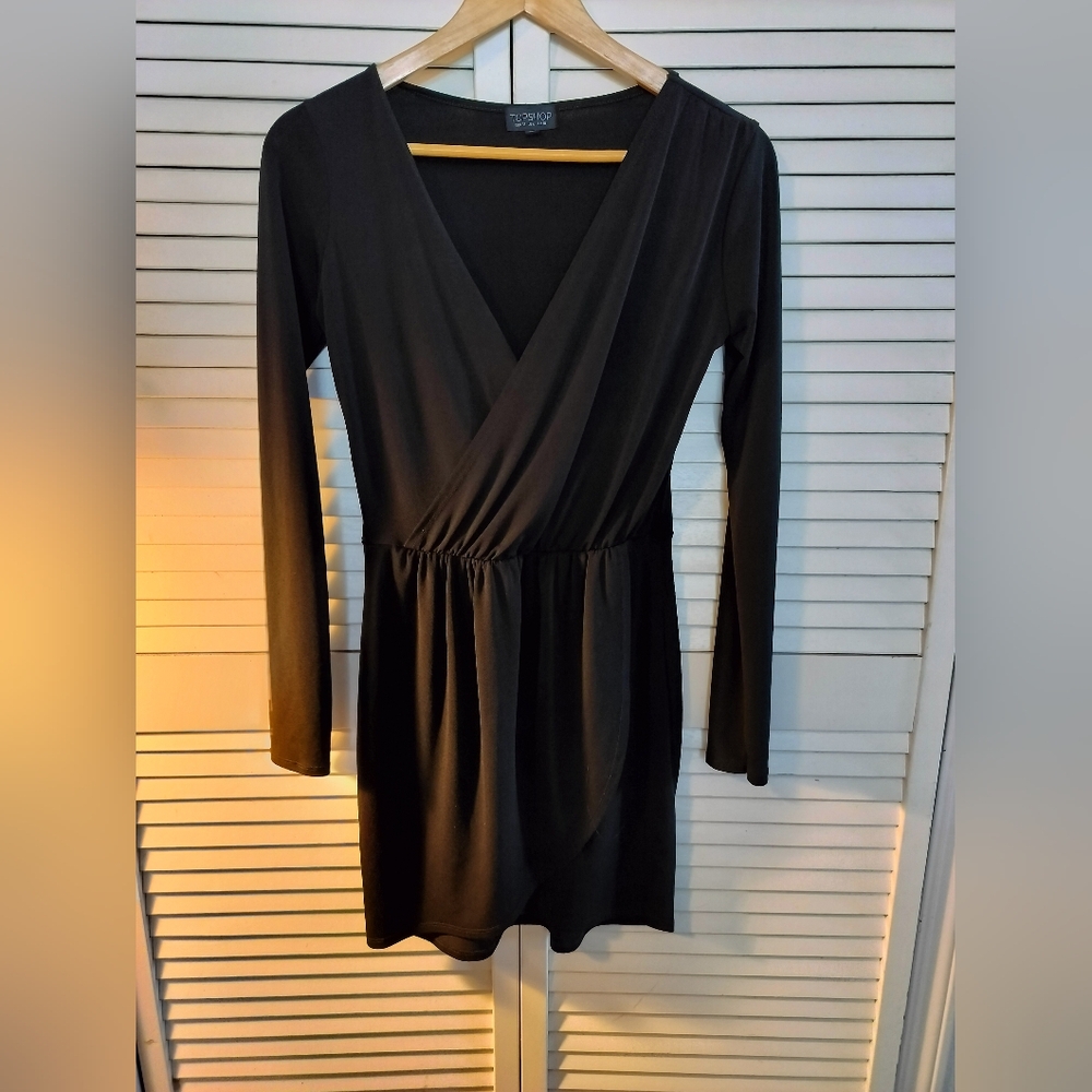 Tiny black long sleeve dress